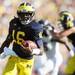 Michigan senior quarterback Denard Robinson runs the ball for yards in the second quarter against UMass at Michigan Stadium on Saturday. Melanie Maxwell I AnnArbor.com